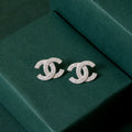 Pave Zircon Interlocking Studs – Stud earrings