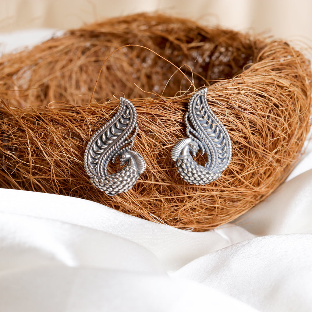 Peacock Studds