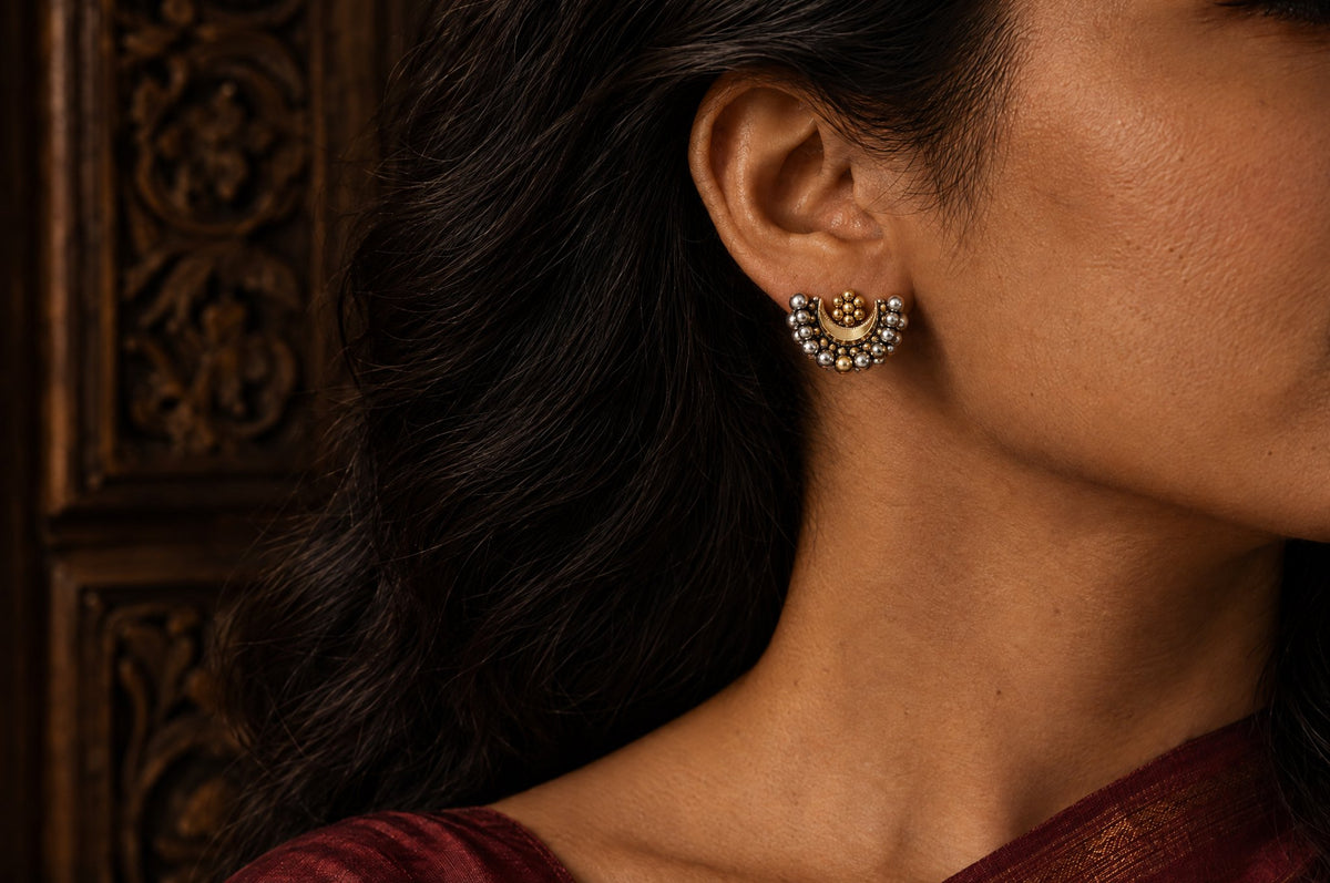 Model wearing the Pratha Dual Tone Chandra Phool Earrings