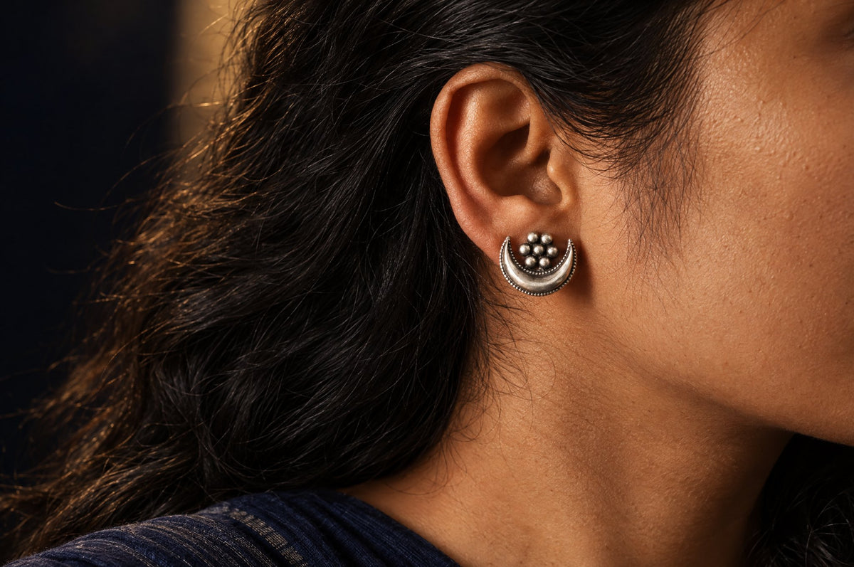 Model wearing the Pratha Chandraphool Earrings - Handcrafted in Sterling Silver