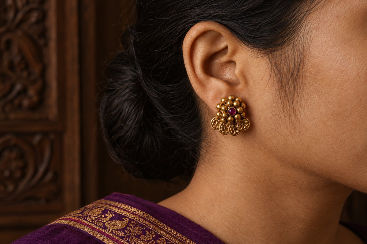 Model wearing the Pratha Goldplated Kudi Studds