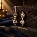 Double Carved Ball Earrings – styled photo